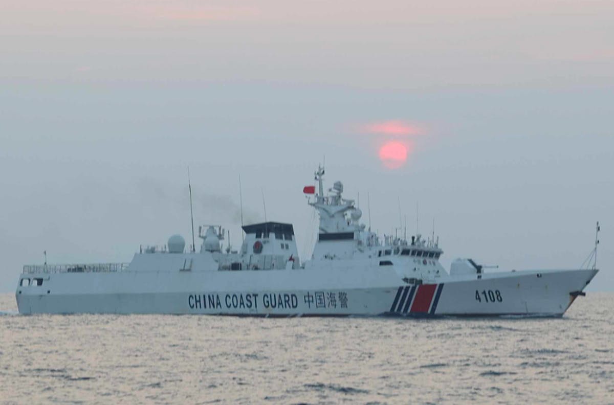 Chinese Coast Guard Shadows Filipinos Sailing Toward Disputed Shoal ...