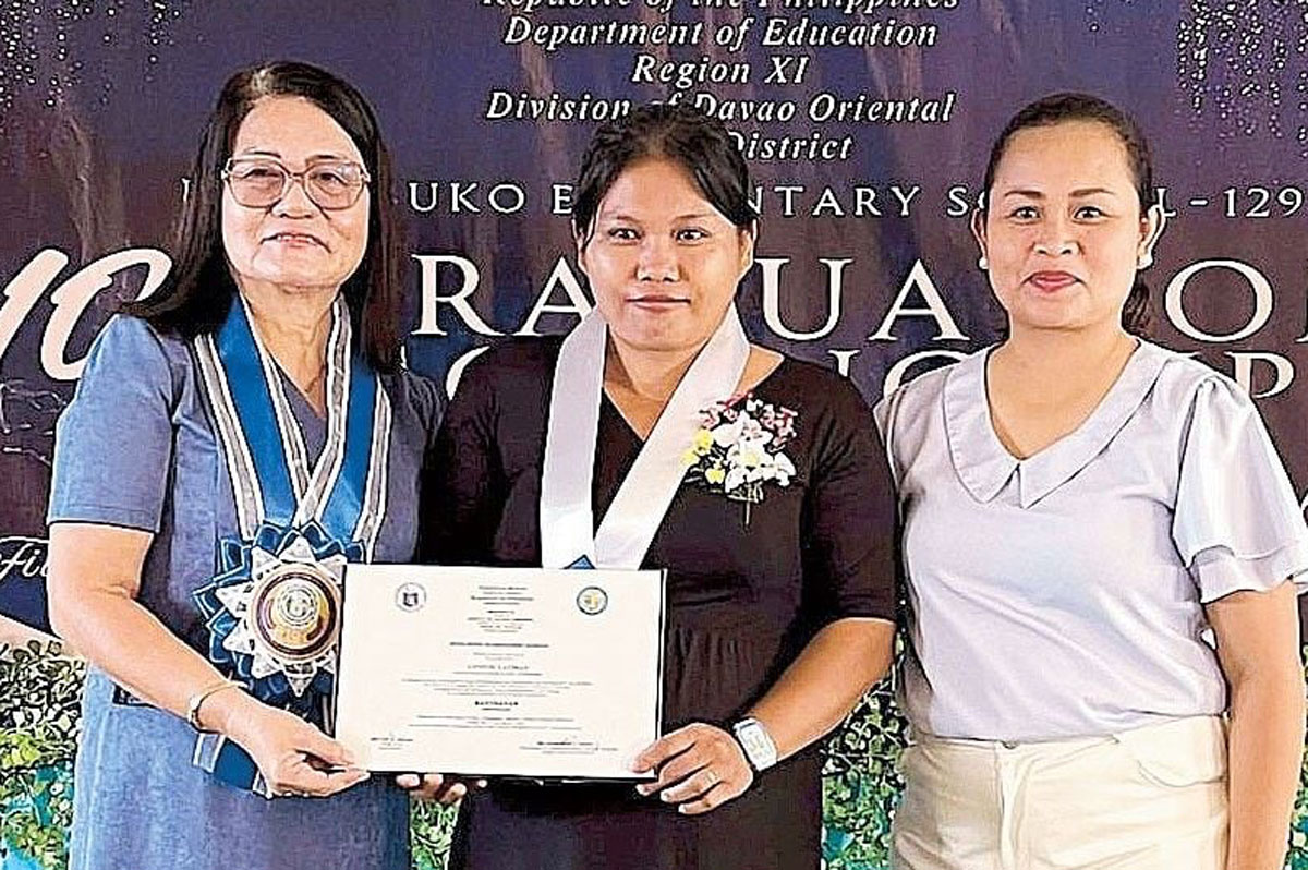 Mother, Child Finish Kindergarten Together
