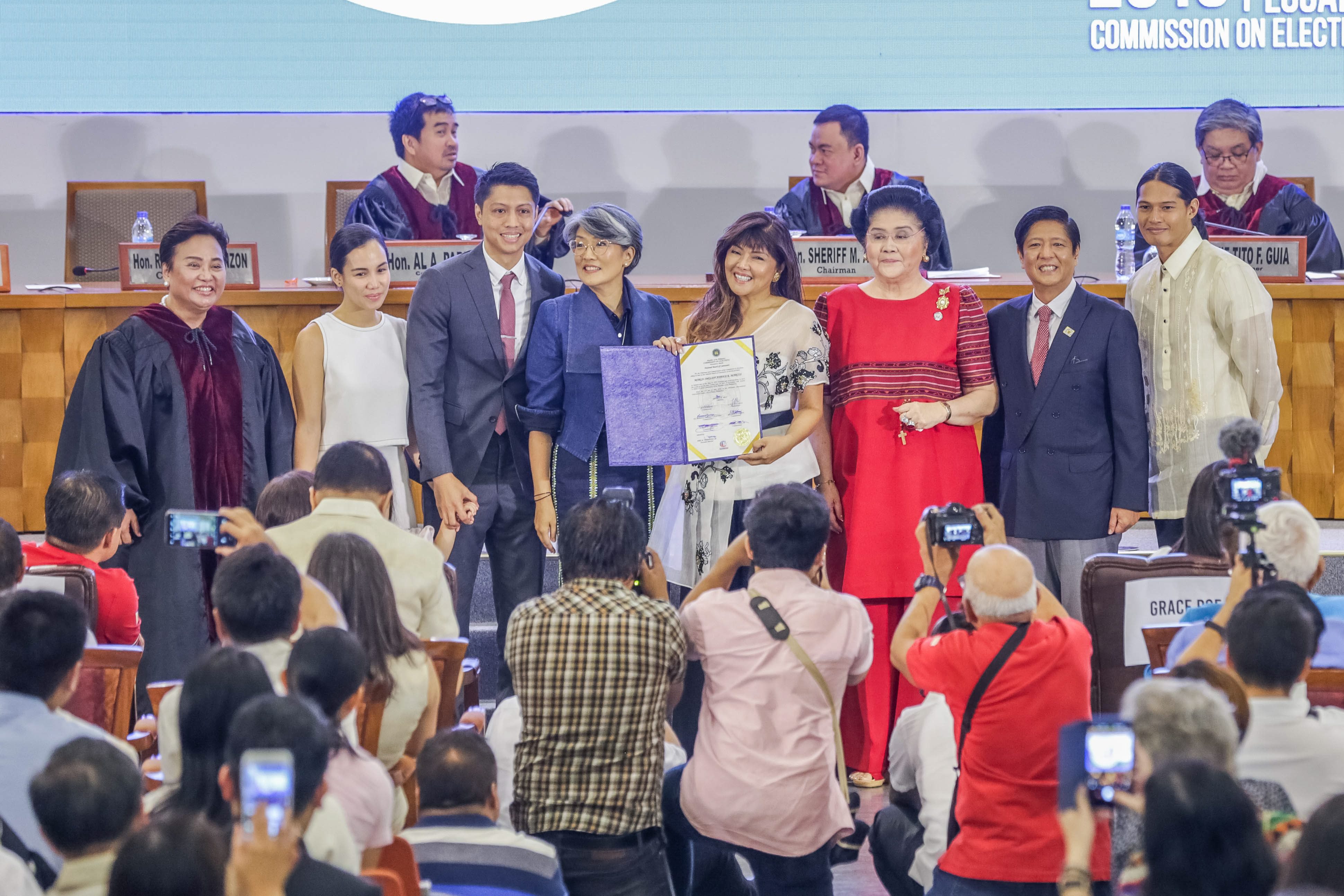  Former Ilocos Norte governor Imee Marcos (fifth from left) is proclaimed winner in the May 2019 senatorial elections. Photo by Geremy Pintolo, The Philippine STAR