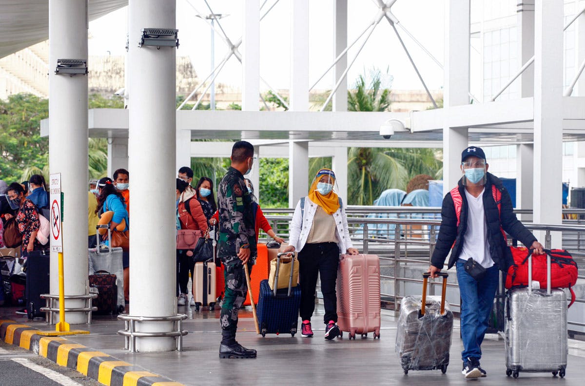 Is Phl Still Free From The New COVID-19 Strain? HK Case Investigated, Travel Ban Expanded