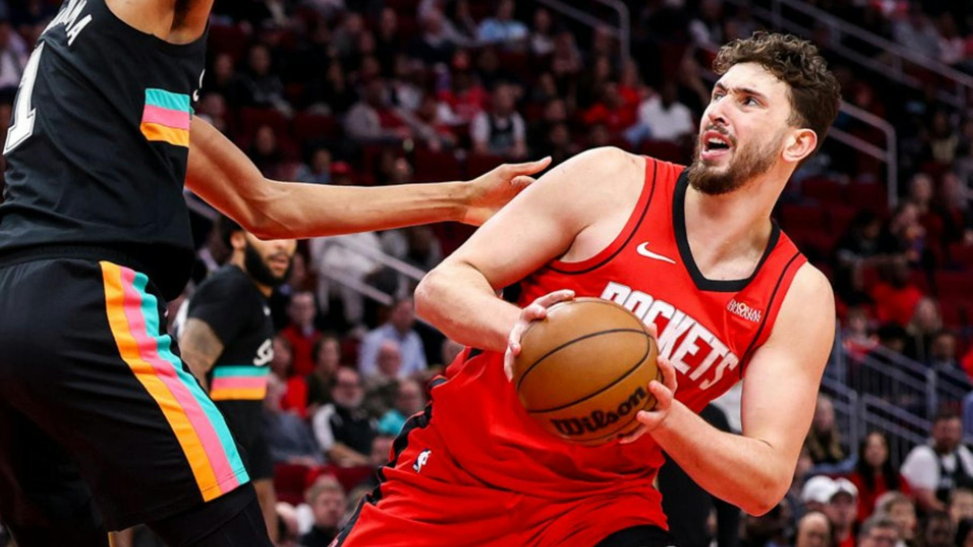 Rockets rally in 4th quarter to stun Spurs