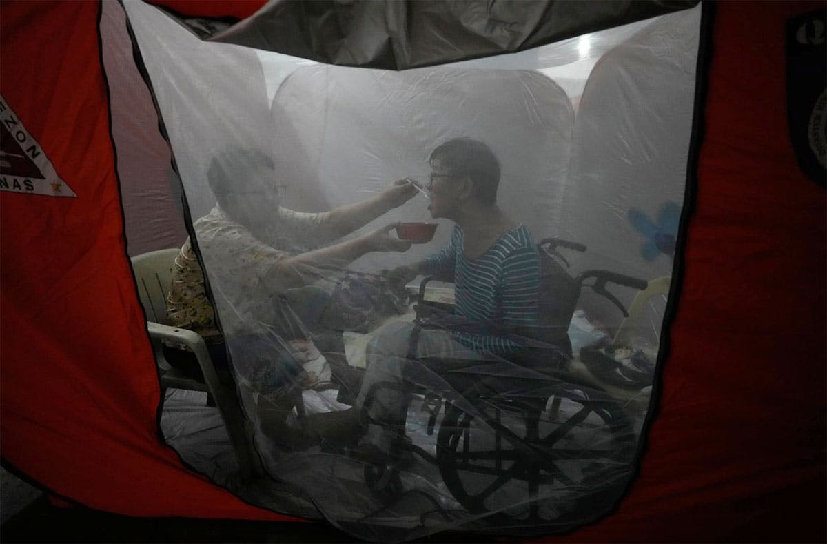 One Photo That Captures Tenderness Amid Chaos Caused By Super Typhoon Uwan