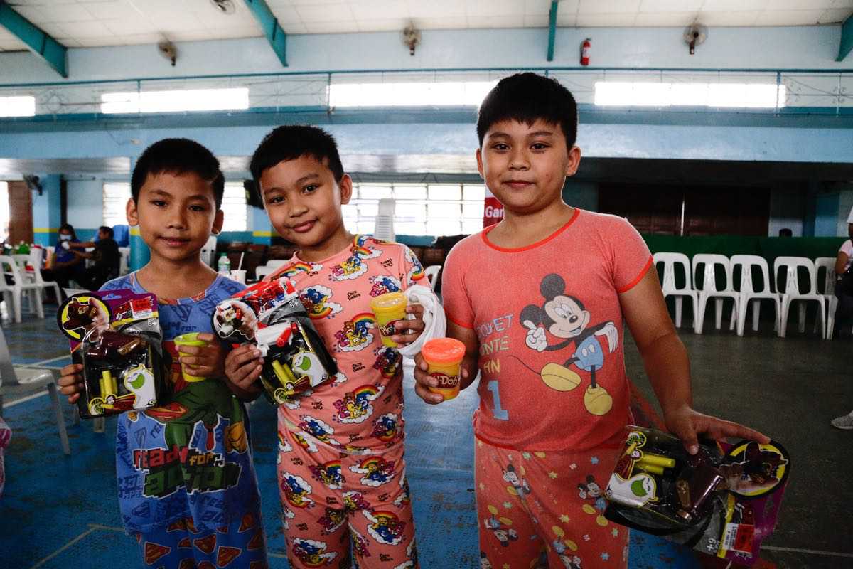 These boys are excited to open and play with their new toys courtesy of The SM Store.